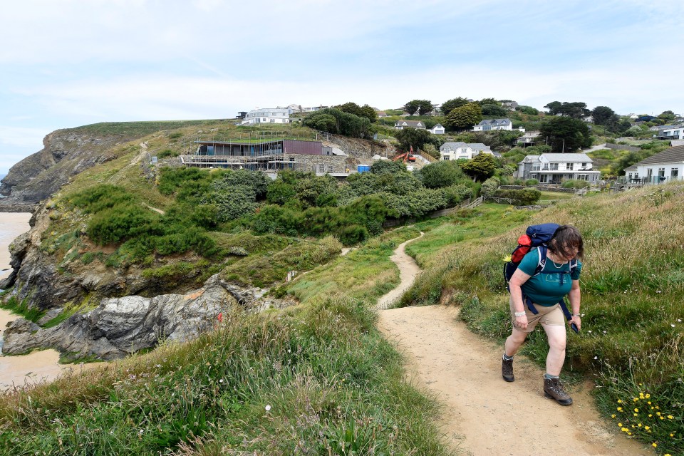 The rugged coastal landscape is popular with walkers