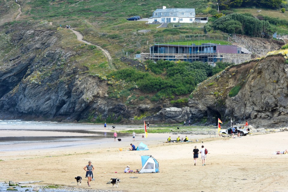 A huge development is currently being built into the cliffside overlooking the beach