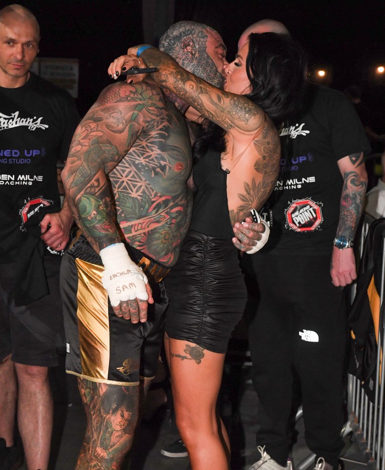 Johnny Ramsay celebrates his win with his partner at ringside