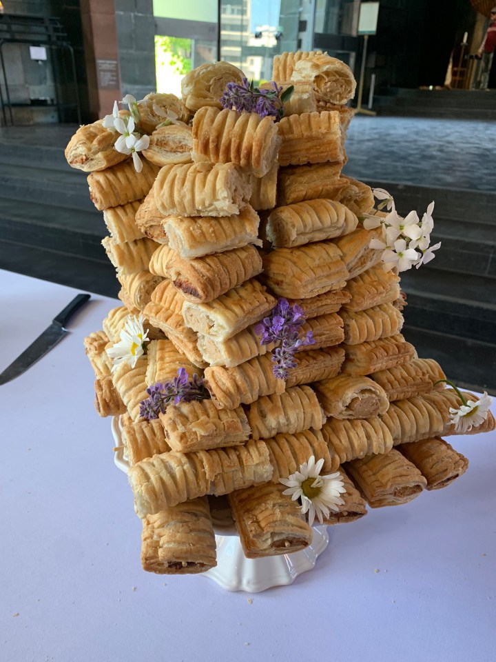 A couple made their wedding day cake from Greggs vegan sausage rolls