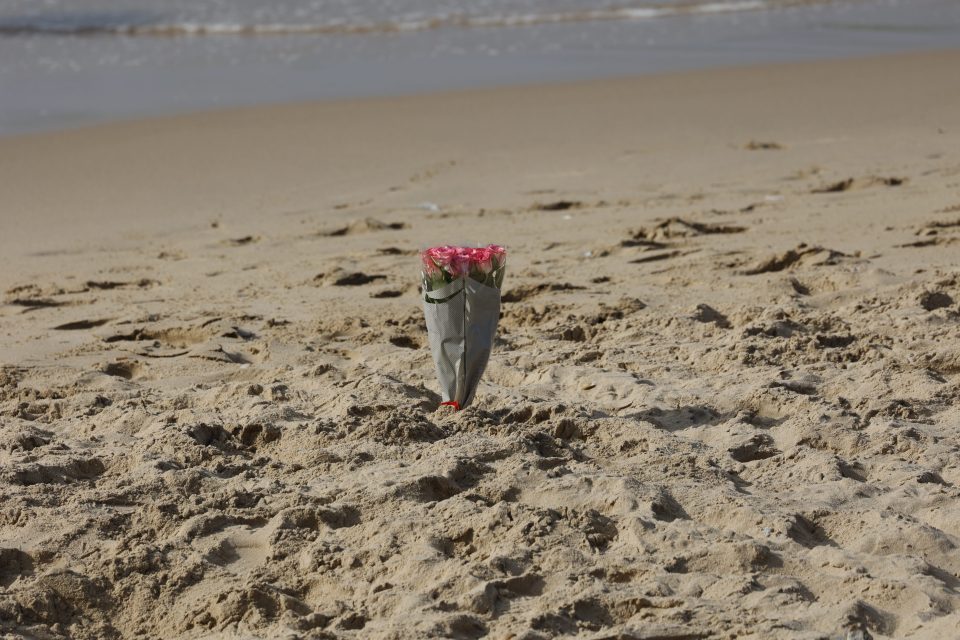 Flowers left at the beach following the tragedy