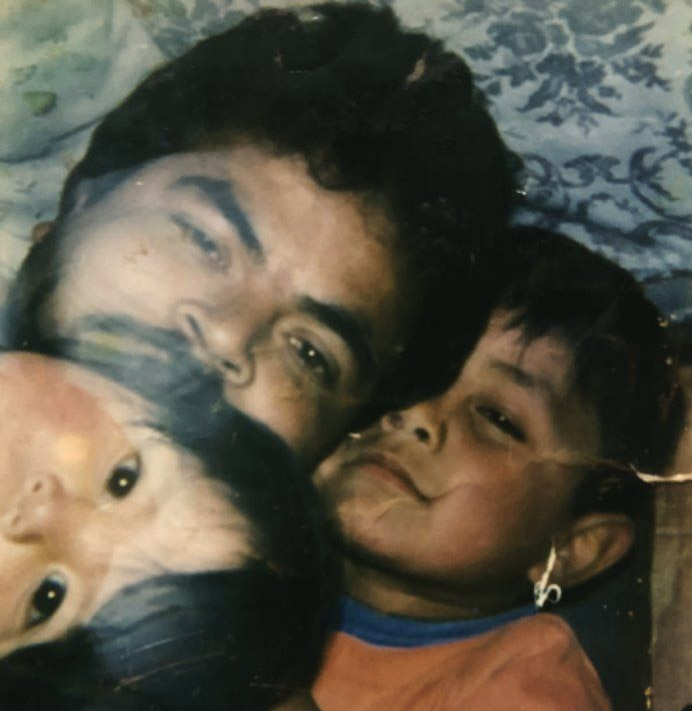 Juana at the time of her disappearance with her dad and brother