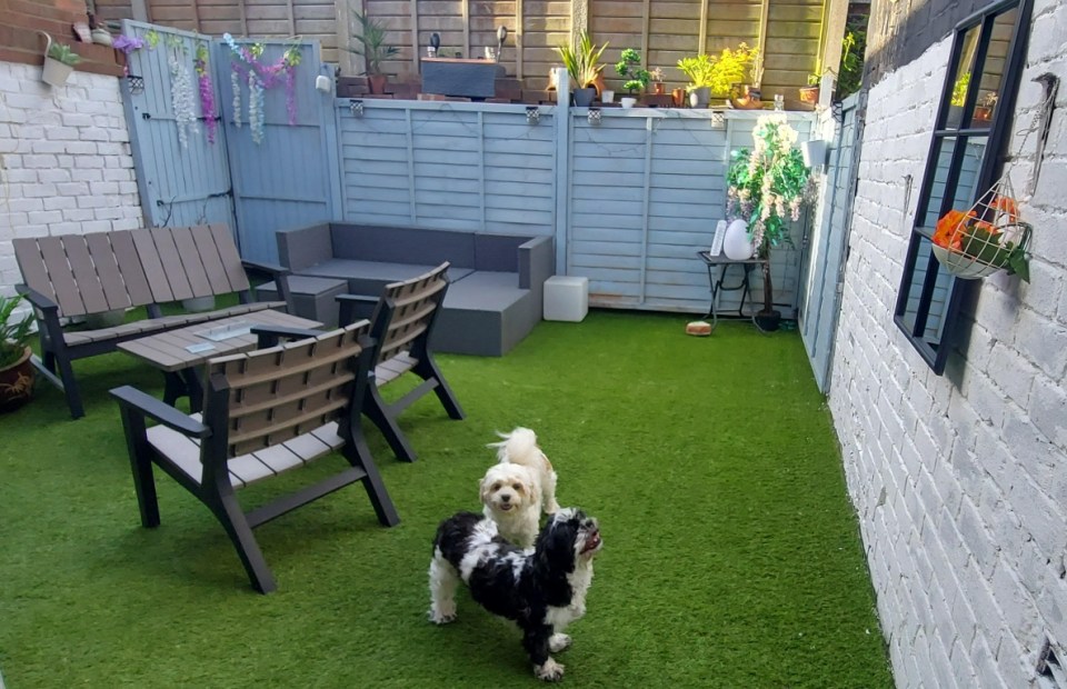 The homeowner added fake grass, a new fence and a stylish mirror from Tesco