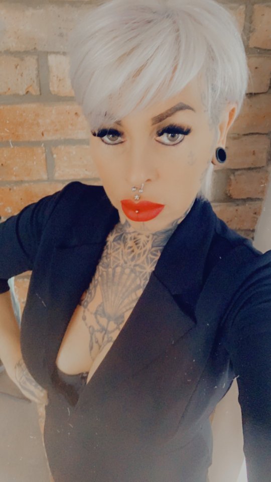 Neighbours of dominatrix Leigh say she takes clients to a cemetery