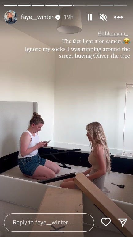 Faye and Chloe struggle with the bed frame after hitting a snag