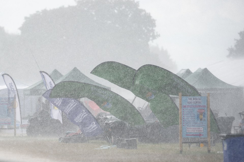 A torrential thunderstorm at the 2023 Royal Cheshire County Show near Northwich, Cheshire