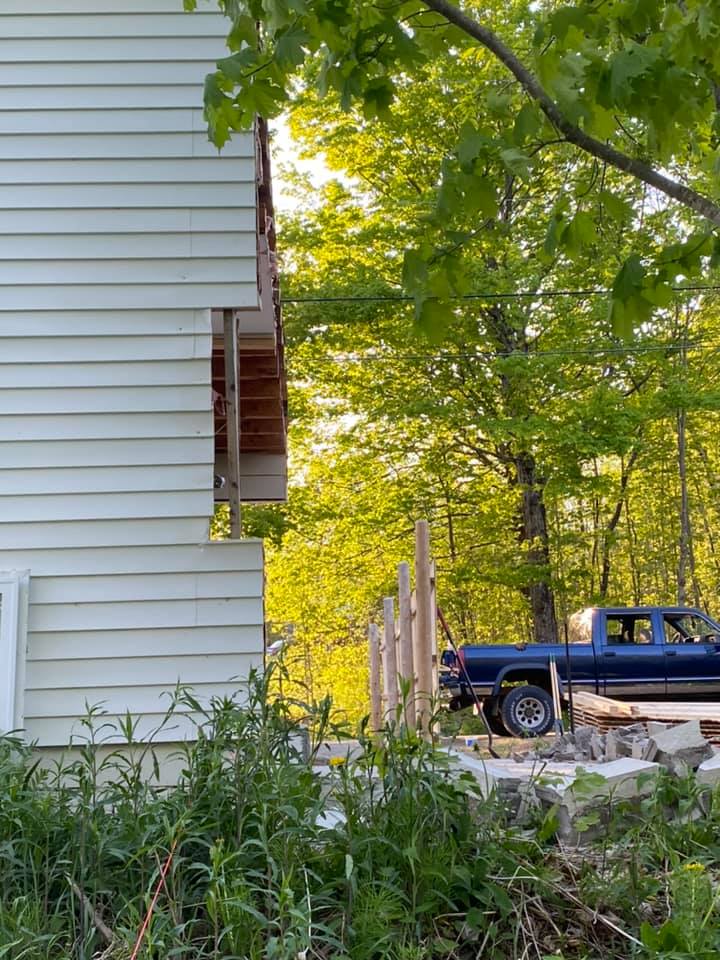 Gabriel got two land surveyors to determine that the garage was partially on his land