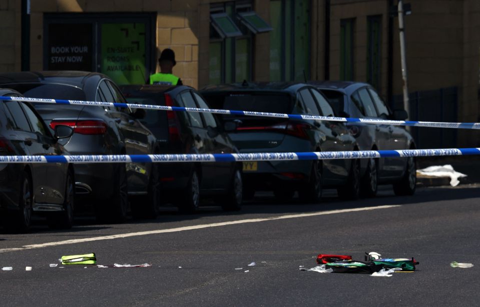 Medical equipment was strewn across Ilkeston Road, where two bodies were found