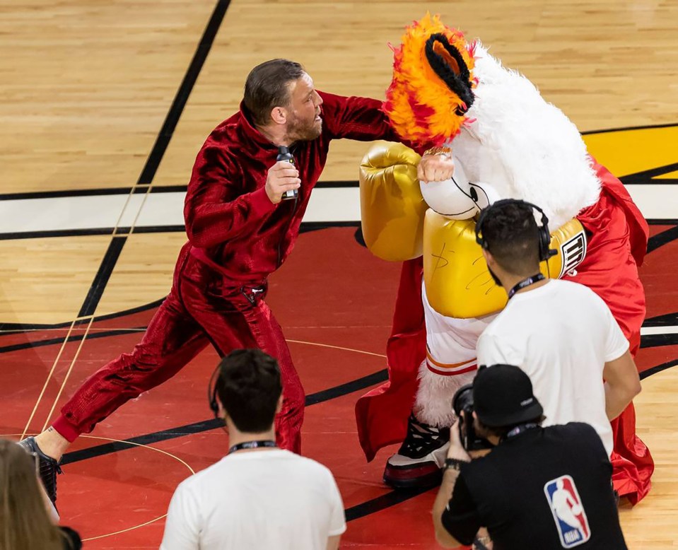 During a timeout at the game, he hooked one of the mascots