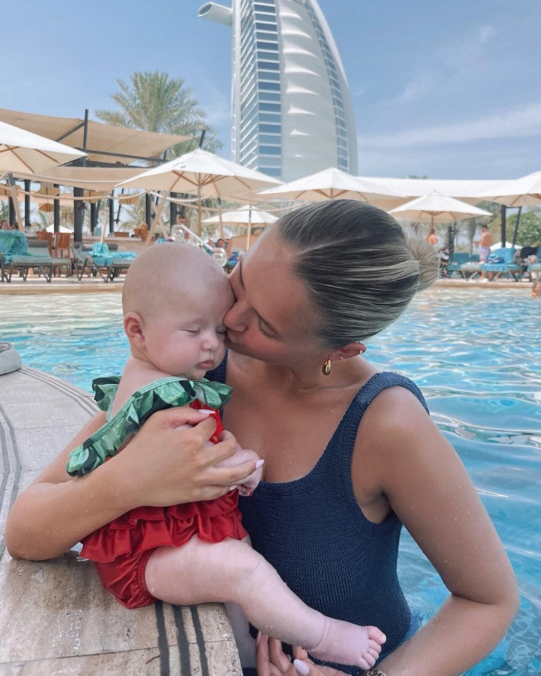 The content creator showed her adorable tot in the £252-per-night Jumeirah Beach Hotel pool