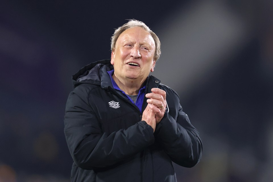 Neil Warnock put together a "great escape" and saved Huddersfield from relegation