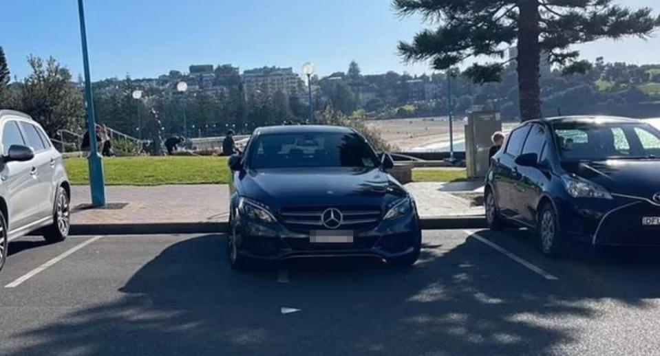 The Mercedes-Benz driver parked their car across two parking spaces