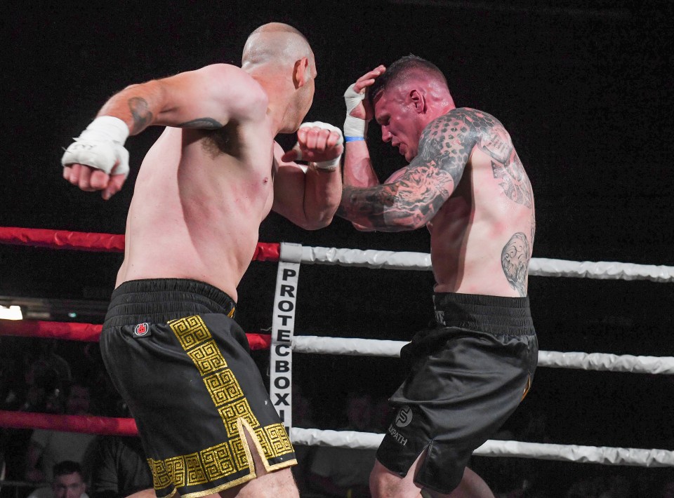 Liam Gell repels an attack by Daz Clarke in the fight of the night