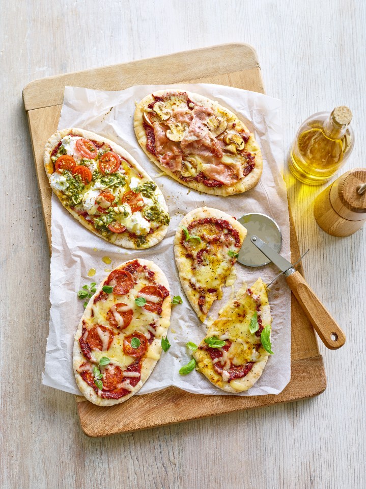 Use pitta bread bases to form your own microwave pizzas