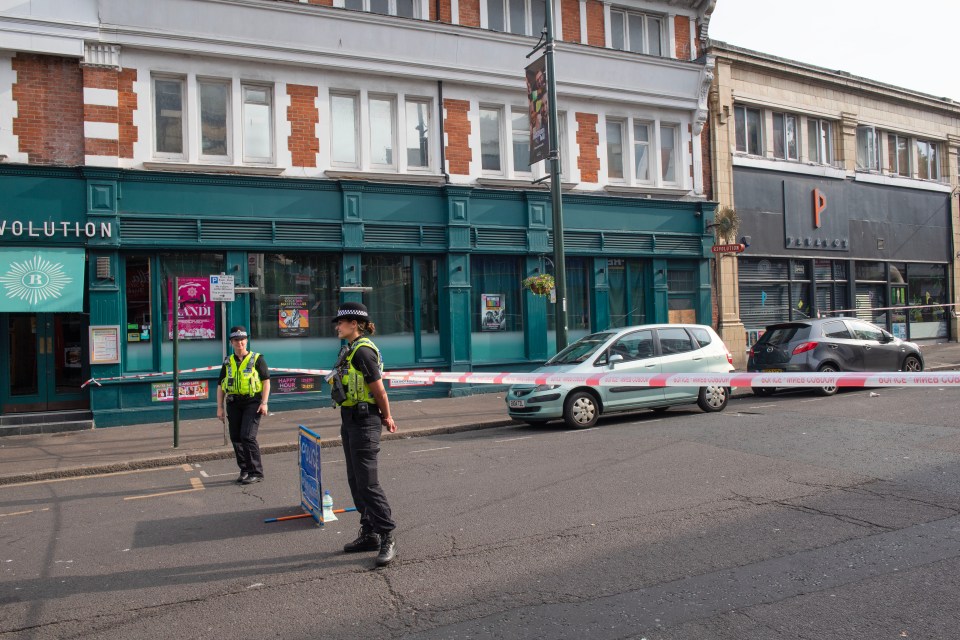 A woman was also rushed to hospital after being stabbed