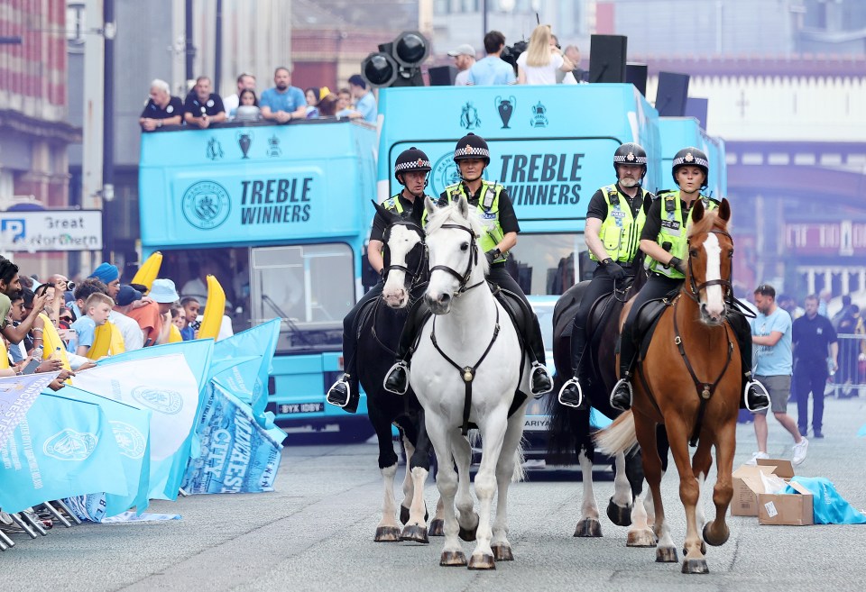 The open-top bus parade was met with swarms of sky blue