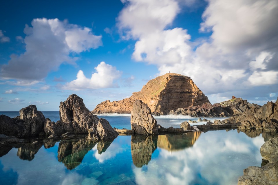 Despite their differences, both pools have panoramic views over the coast.