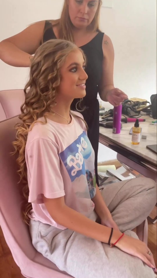 Princess had her hair professionally styled for her prom