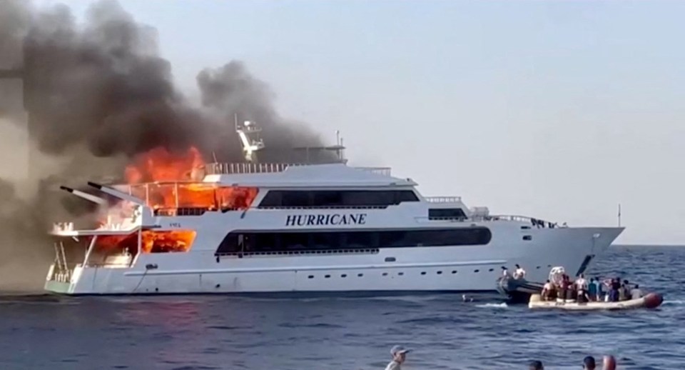 Emergency crews rescued passengers while the boat was engulfed in flames