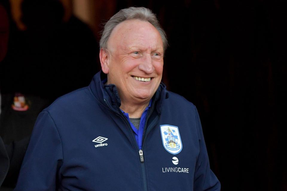 Huddersfield have rewarded Warnock with a new one-year deal