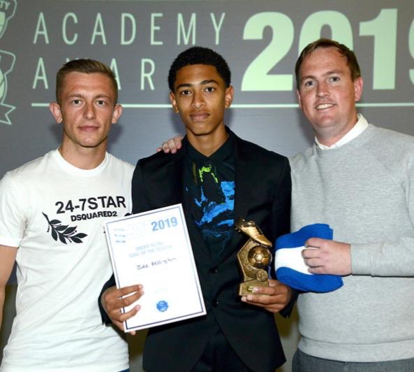 Jude Bellingham with his academy manager Michael Dodds (right)