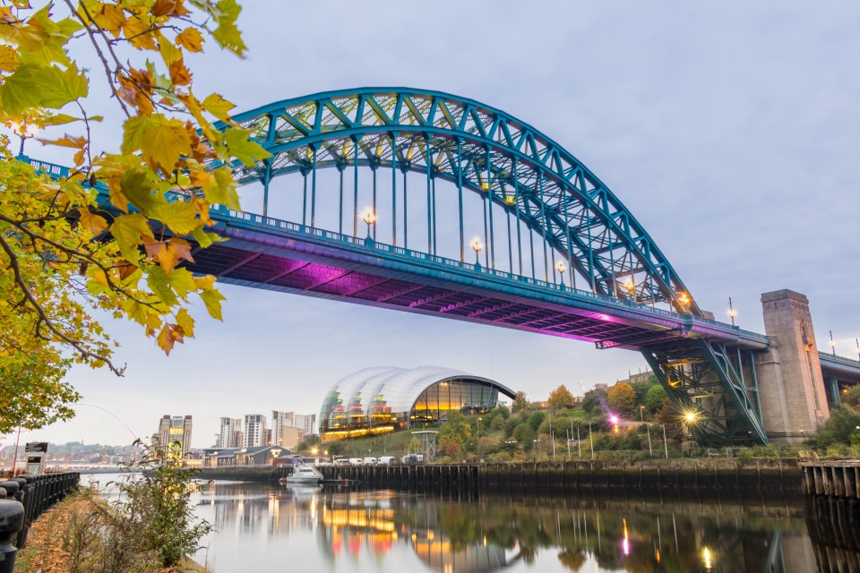 The Tyne Bridge stretches across the Tyne from Newcastle to Gateshead