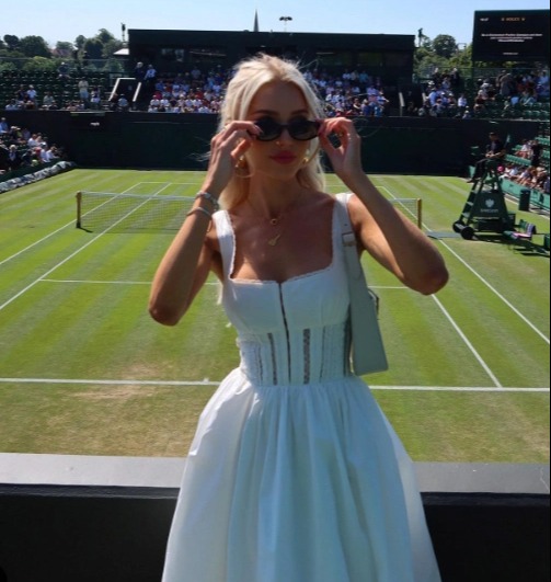 Morgan Riddle wore a white dress to Wimbledon on Saturday