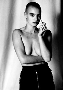  Sinead O'Connor was best known for being an Irish singer and ironically recognized for her shaven head