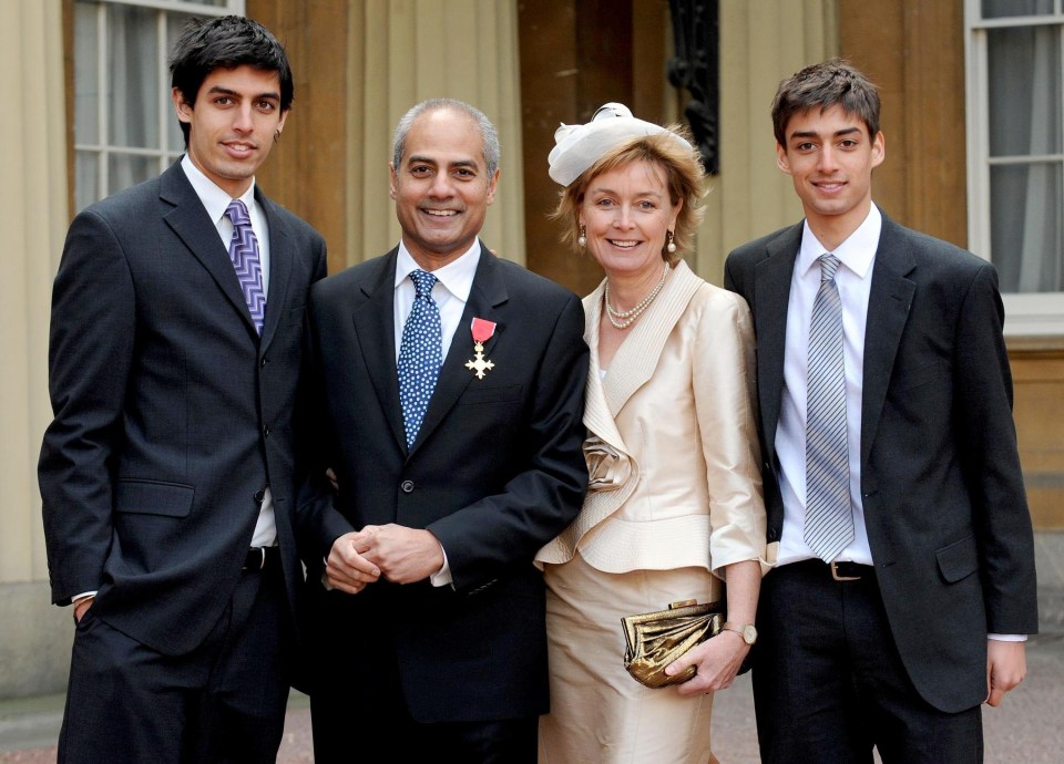 The journalist pictured with his wife Fran and sons Adam and Matt