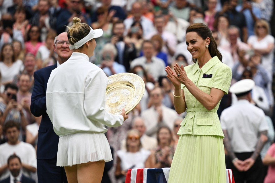 Kate applauds as Vondrousova prepares to lift the trophy