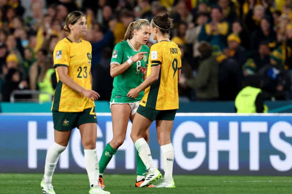 Ireland's Ruesha Littlejohn was restrained by a teammate after confronting Australia's Caitlin Foord