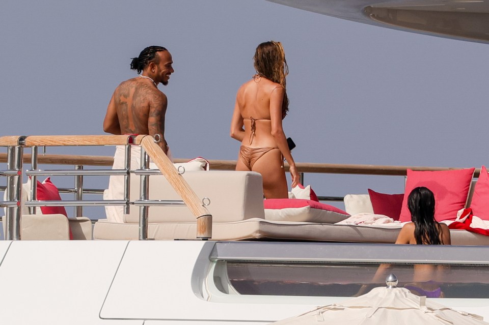 Lewis Hamilton relaxed onboard a yacht alongside Jenny Stray Spetalen