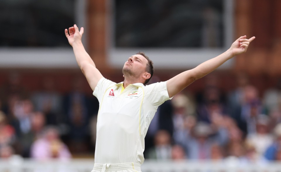 Josh Hazlewood celebrates after taking Stokes' wicket