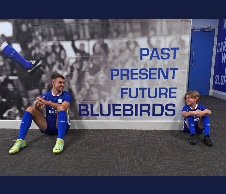 The Ramsey family are all smiles on a memorable day in the Welsh capital