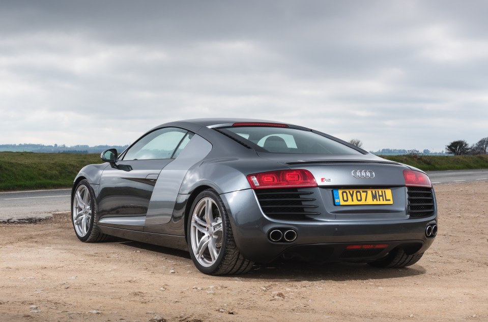 The sporty R8 features quad exhausts, a rear spoiler and chunky 19-inch wheels