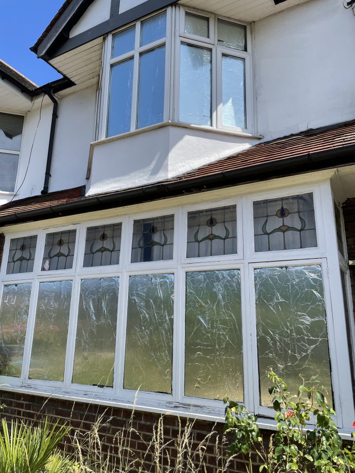 Windows are covered in kitchen foil to reflect heat out