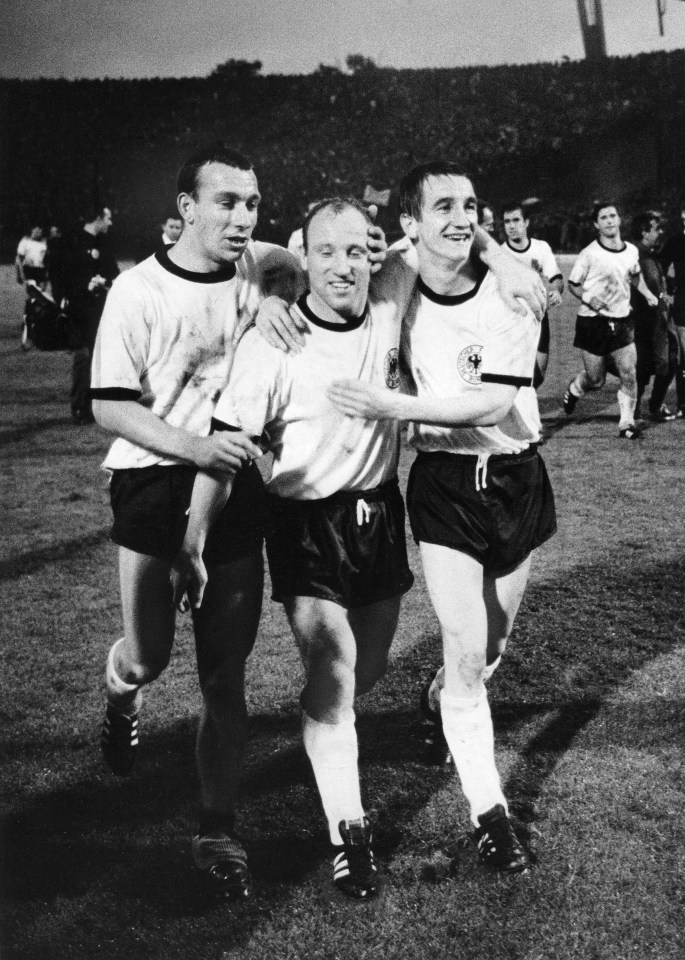 Horst-Dieter Höttges, left, in action for Germany