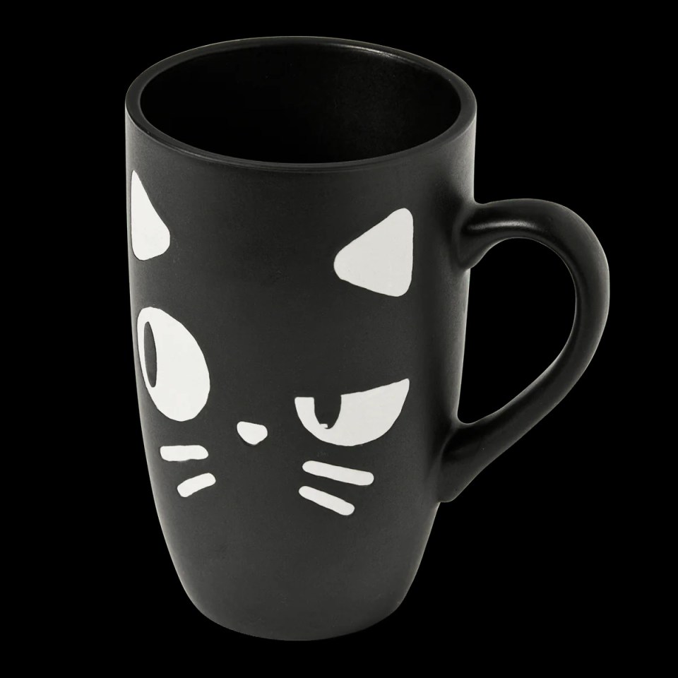 Halloween has come early with this cheeky cat mug