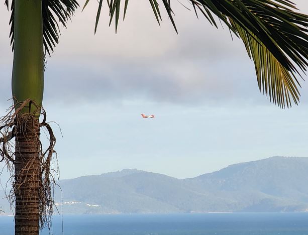 Military aircraft are conducting a search and rescue operation off Hamilton Island