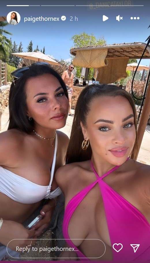 Paige Thorne has stripped to a white bikini as she partied with her Love Island co-star Danica Taylor