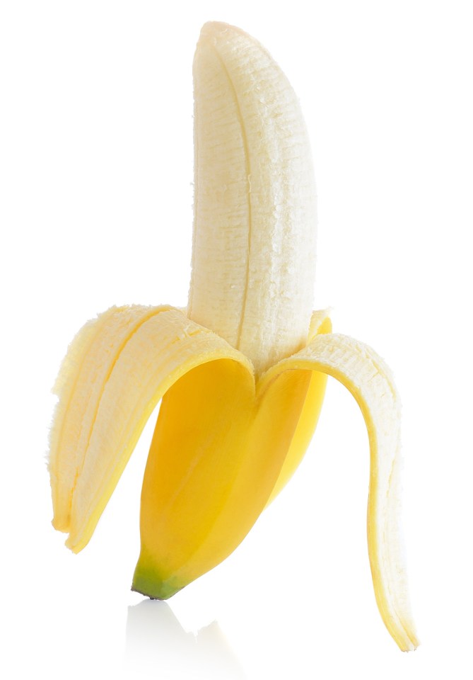 Squeeze the knobbly bit at the bottom and the banana should pop open easily