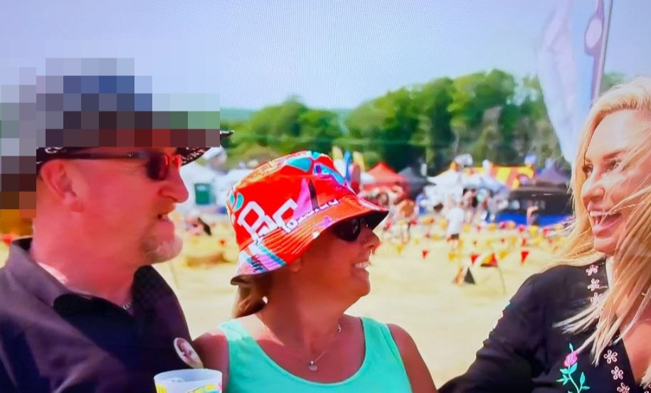 A man appeared alongside Josie Gibson in a rude hat the previous day