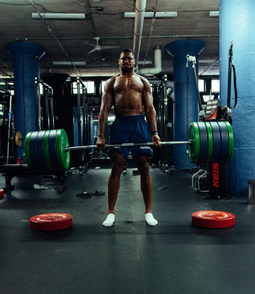 Anthony Joshua hit the weights as he prepares for his proposed rematch with Dillian Whyte