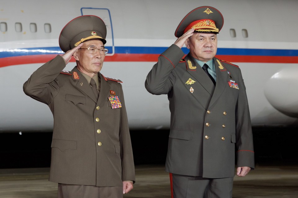 Sergei Shoigu, right, attends a ceremony of the official meeting of the Russian delegation with the participation of the guard of honor of the Korean People’s Army