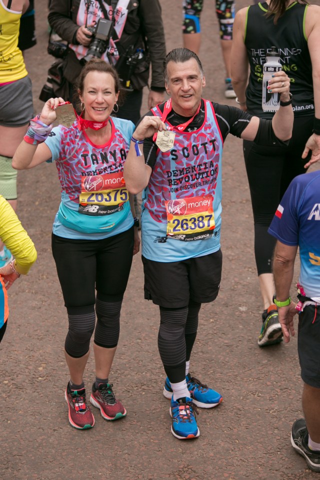 Scott and Tanya at the finish line of the London Marathon in 2019