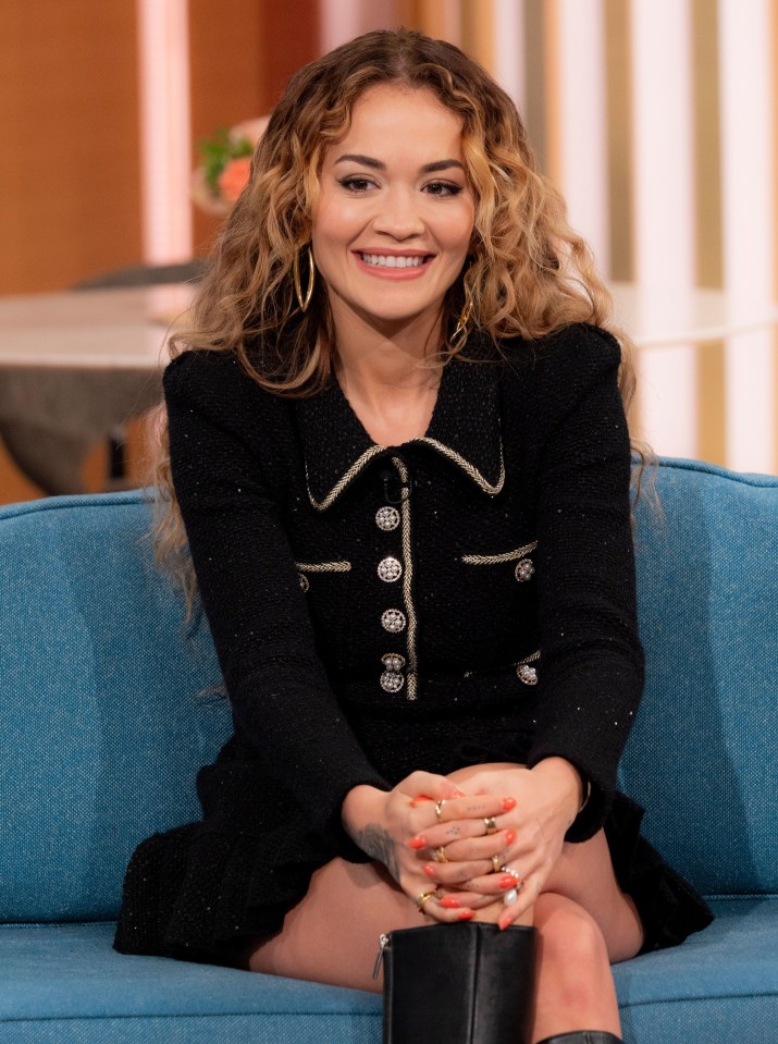 Rita Ora flashed her legs in thigh-high boots as she starred on This Morning