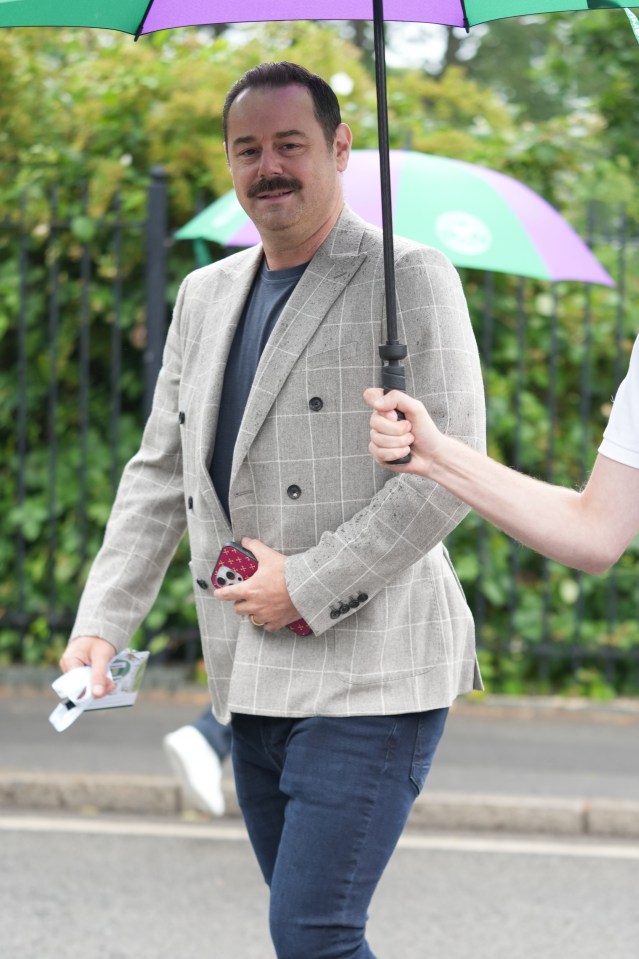 Danny Dyer also braved the rain at Wimbledon