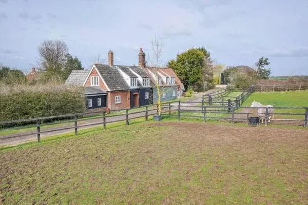 The four-bedroom included a quarter of an acre of gardens and a stable