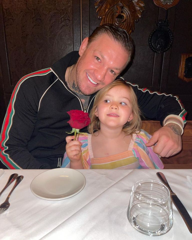 McGregor cuddled daughter Croia at the dinner table