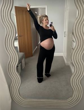 Danielle showed off her huge bump yesterday